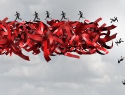 An image of what looks like two qubits touching, symbolising quantum computing and future physics concepts.