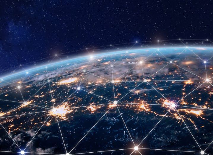 Telecoms network points lit up on a section of the globe.