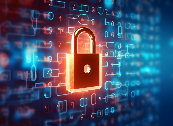 A red lock on a digitised screen that has many numbers and lines on it, symbolising a cyberattack.